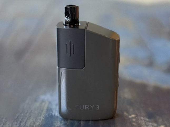 Dark Grey Fury 3 portable vaporizer with sleek matte finish, emphasizing its pocket-sized profile and modern look.