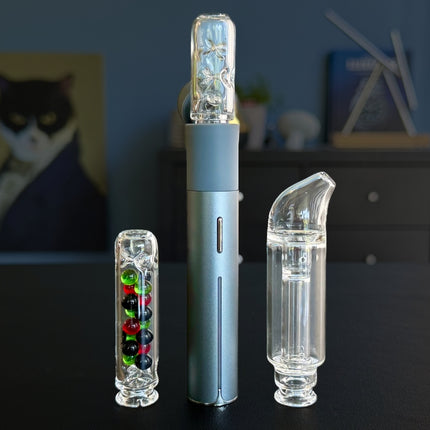 Puffco Pivot with compact cactus glass stem installed, shown alongside all three glass stem options on tabletop