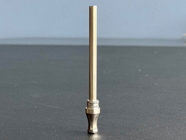 dynavap m7 condenser assembly w/mouthpiece assembled sitting on desk