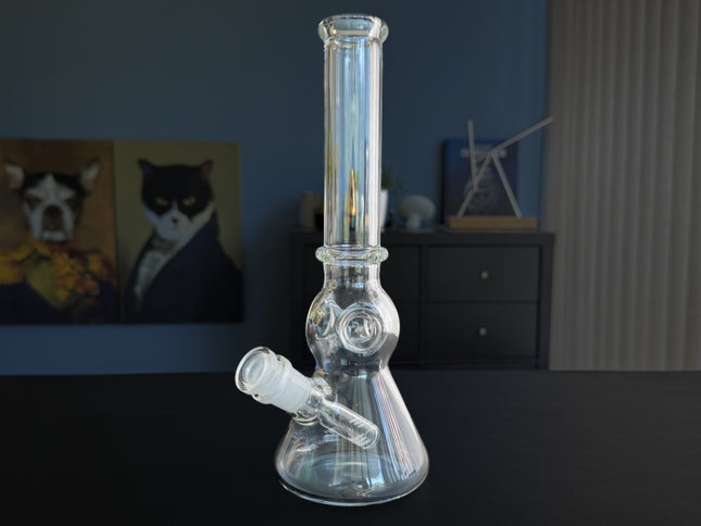 Full view of The Triple Play Pipe water pipe standing upright on tabletop with cone-style base and triple splash catcher