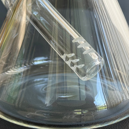 Close-up of 6-slit tube-style percolator downstem inside The Triple Play Pipe’s triangular cone base
