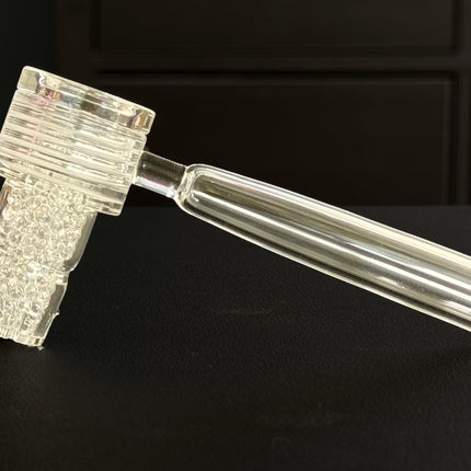 Close-up of the Vapvana Natural showing clear glass and densely packed quartz balls.