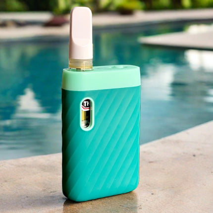 ccell sandwave in marine green with cartridge inserted