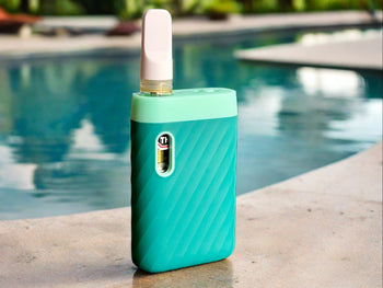 ccell sandwave in marine green with cartridge inserted