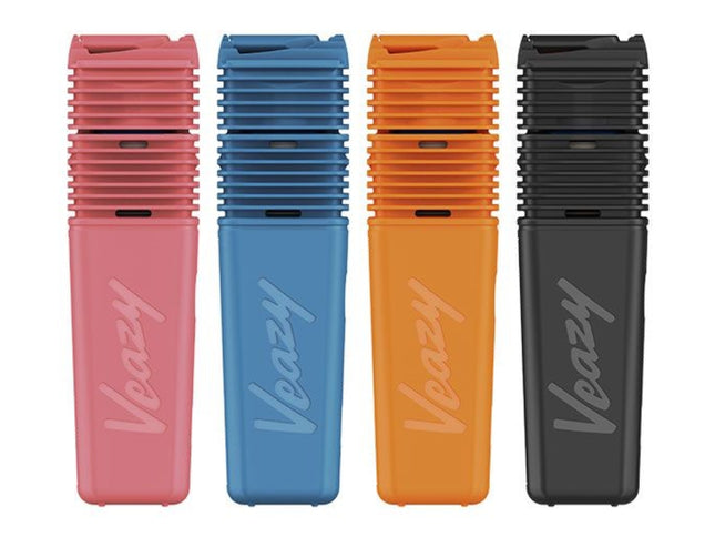 All four Storz & Bickel VEAZY vaporizers lined up in Black, Blue, Orange, and Pink — compact dry herb vaporizers with hybrid heating and modern design.