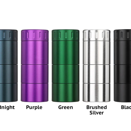 Group photo of the Mad Heaters Reload 3 in all available colours — black, midnight, silver, purple, and green — showing its compact aluminium design.