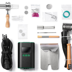 Ruby Twist Pro complete kit showing all included components, including injector, coil, bowl, tools, and accessories laid out for clarity.