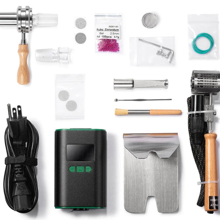 Ruby Twist Pro complete kit showing all included components, including injector, coil, bowl, tools, and accessories laid out for clarity.