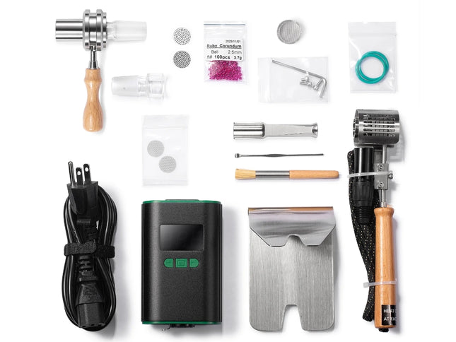 Ruby Twist Pro complete kit showing all included components, including injector, coil, bowl, tools, and accessories laid out for clarity.