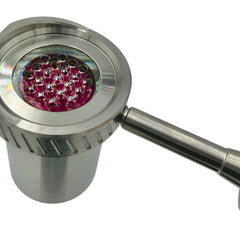 Close-up of Universal Baller quartz-lined heater head showing ruby balls and all-glass air path inside metal housing