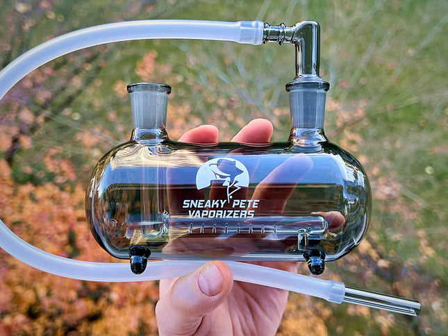 Submarine Pipe glass tubular water pipe with silicone whip on grass background