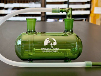 Green Submarine Pipe™  on a table.