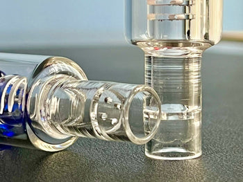 close up of glass bowl with permanent screen in arizer rocket stem