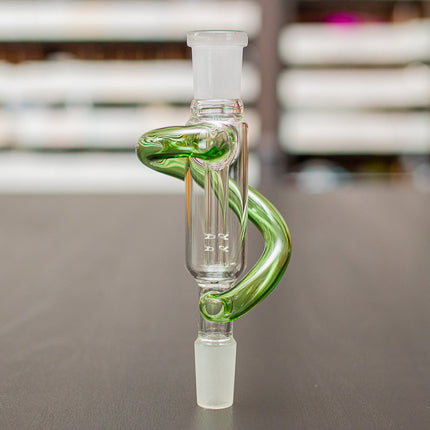 Glass dry herb catcher on a table.